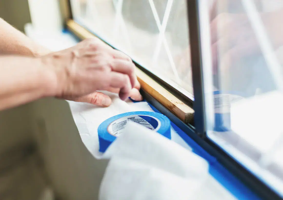 Robinson Painting crew performing total masking and surface preparation for interior painting projec…