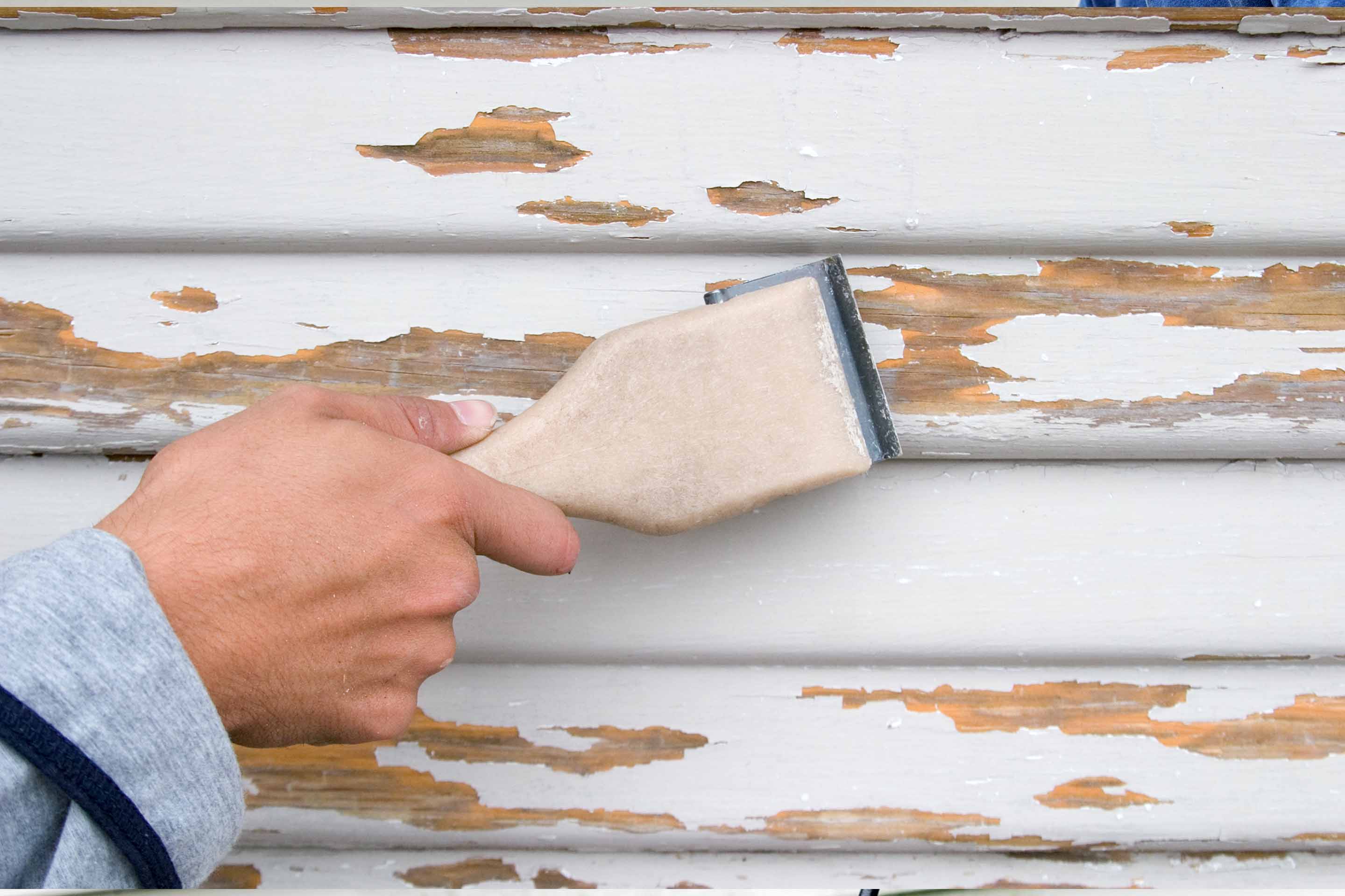 Detailed scraping and sanding of exterior surfaces by Robinson Painting of Colorado LLC