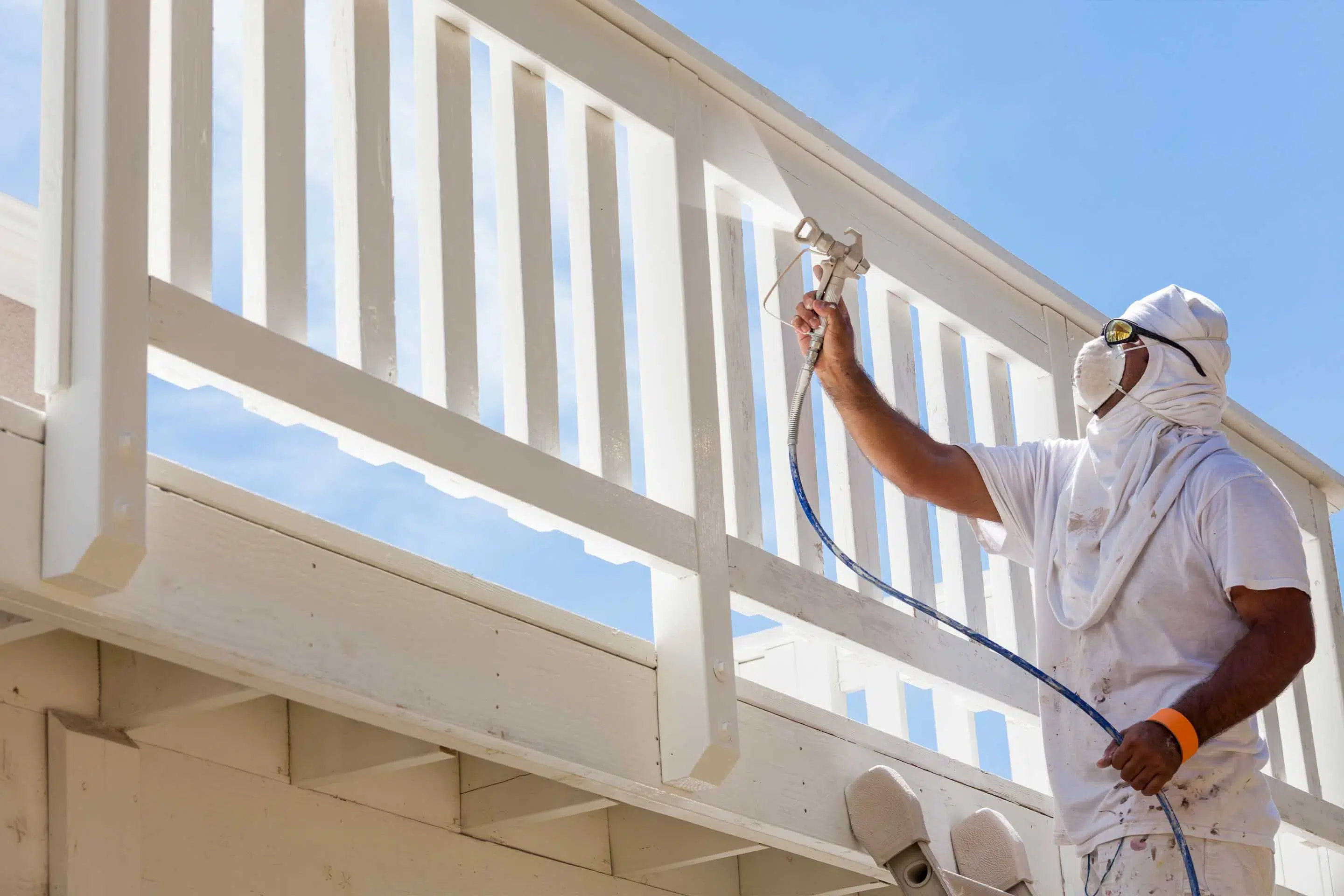 Professional spray application of Sherwin-Williams exterior finish by Robinson Painting in Boulder, Colorado